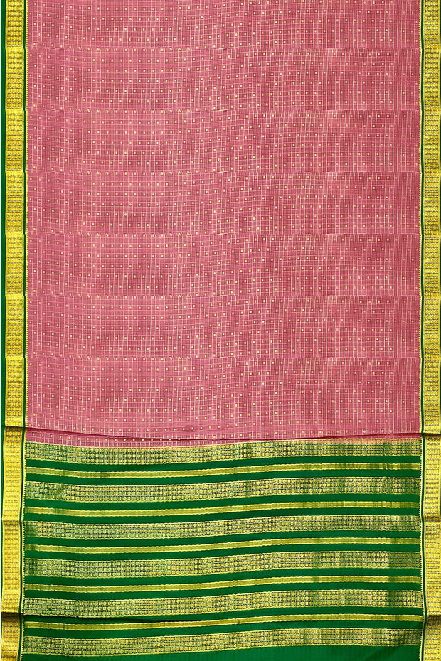 Mysore crepe pure silk saree in onion pink   with small checks & buttis all over the body.