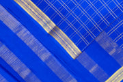 Mysore crepe pure silk saree in royal blue  in fine zari checks all over the body