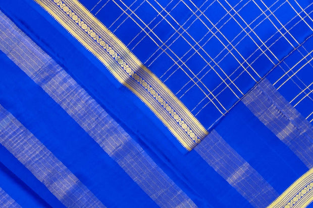 Mysore crepe pure silk saree in royal blue  in fine zari checks all over the body