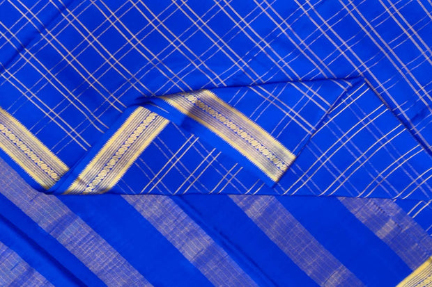 Mysore crepe pure silk saree in royal blue  in fine zari checks all over the body