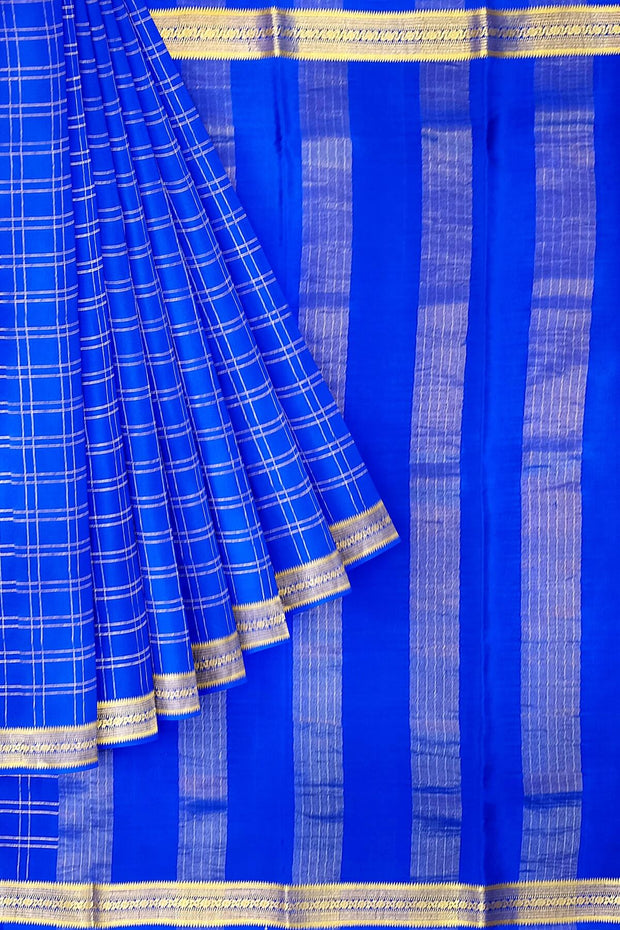 Mysore crepe pure silk saree in royal blue  in fine zari checks all over the body