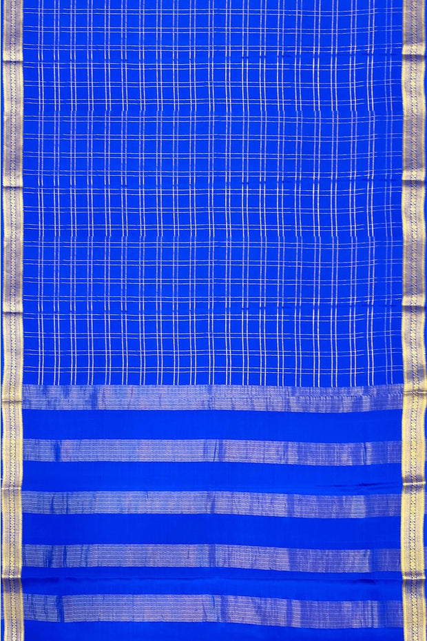 Mysore crepe pure silk saree in royal blue  in fine zari checks all over the body
