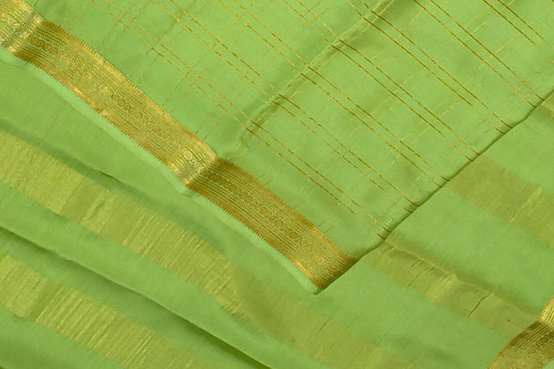 Mysore crepe pure silk saree in pista green  in fine zari checks all over the body