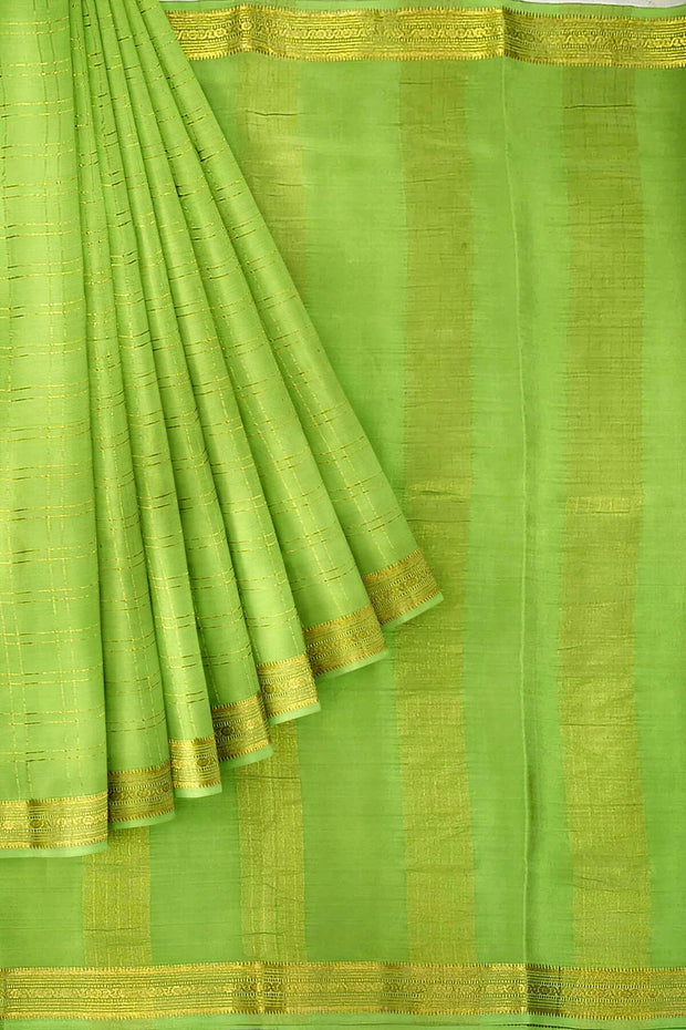 Mysore crepe pure silk saree in pista green  in fine zari checks all over the body