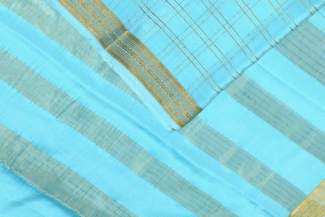 Mysore crepe pure silk saree in pool blue  in fine zari checks all over the body
