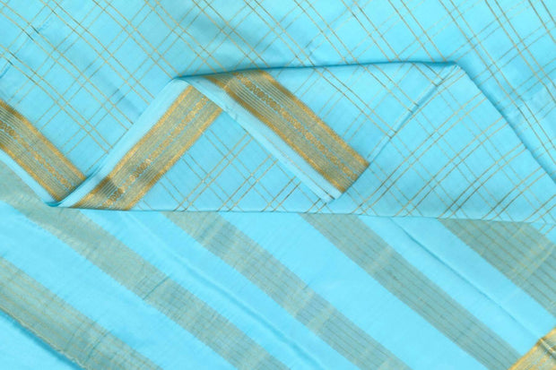 Mysore crepe pure silk saree in pool blue  in fine zari checks all over the body