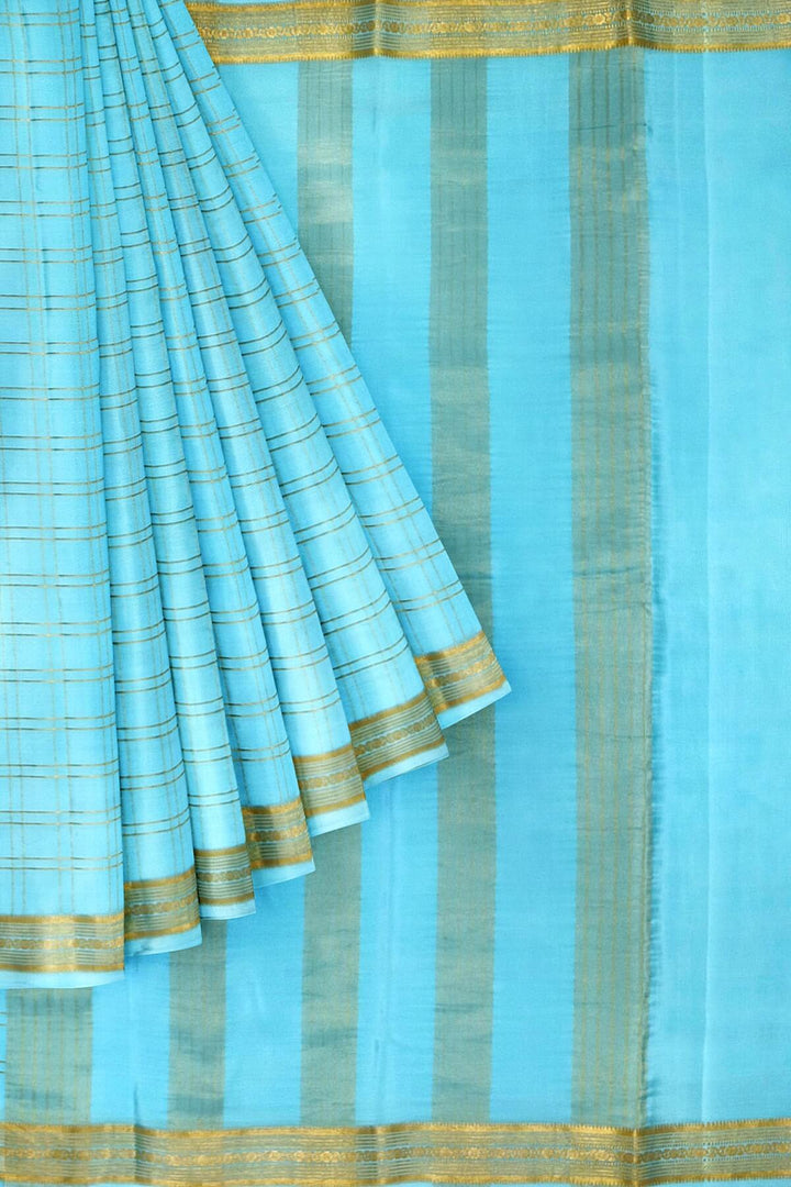 Mysore crepe pure silk saree in pool blue  in fine zari checks all over the body
