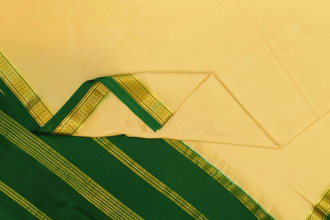 Mysore crepe pure silk saree in beige with contrast pallu & a two  inch border