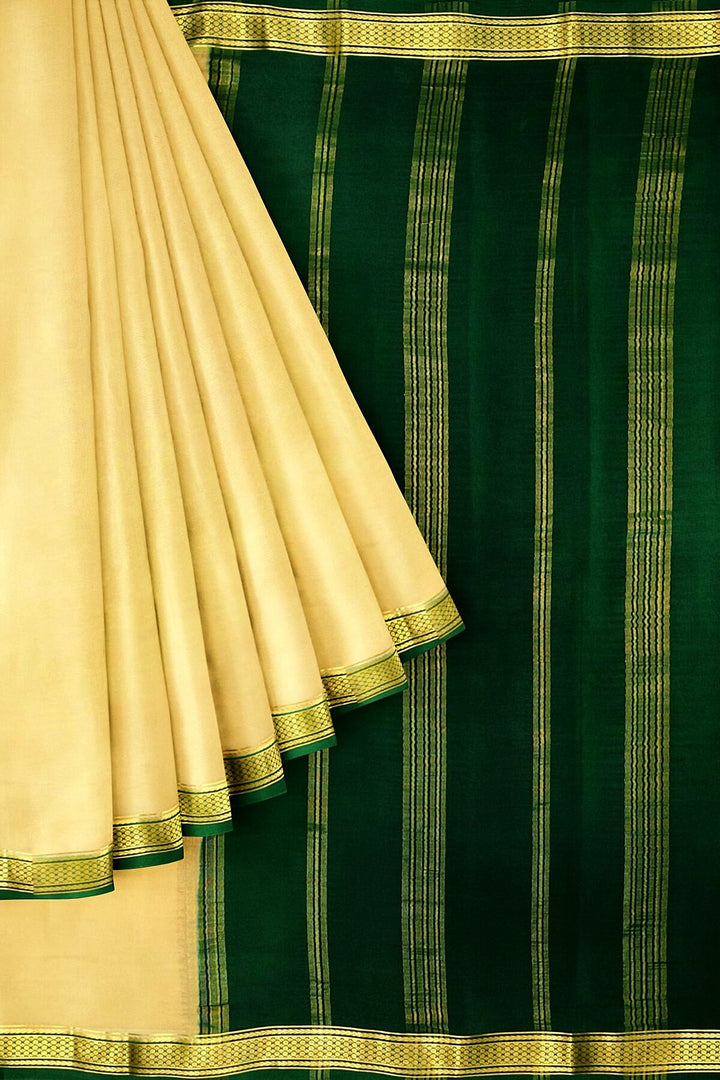 Mysore crepe pure silk saree in beige with contrast pallu & a two  inch border
