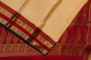 Mysore crepe pure silk saree in light peach with small checks