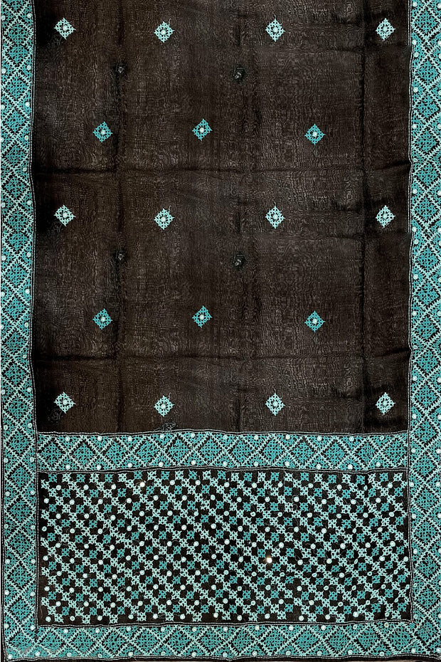 Beautiful silk organza saree in black with kutch work