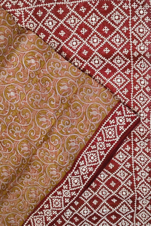 Organza silk saree  in mustard & pink  with kutch embroidery borders & pallu