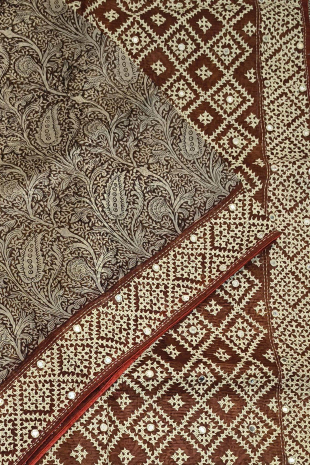 Organza silk saree  in brown with kutch embroidery borders & pallu