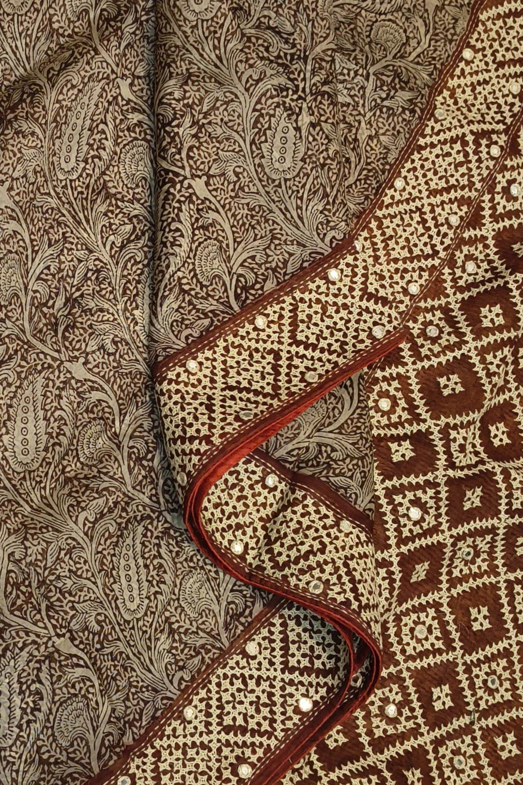 Organza silk saree  in brown with kutch embroidery borders & pallu
