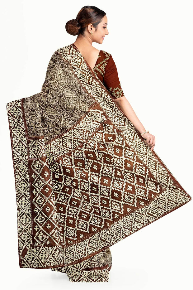 Organza silk saree  in brown with kutch embroidery borders & pallu