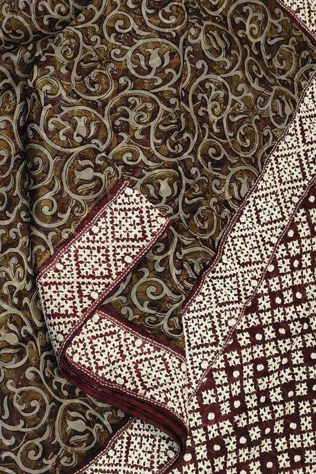 Organza silk saree  in olive green & black with kutch embroidery borders & pallu