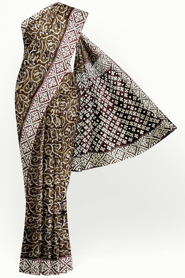 Organza silk saree  in olive green & black with kutch embroidery borders & pallu