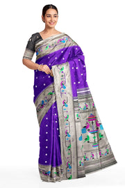 Paithani pure silk saree in violet with small floral motifs all over the body.