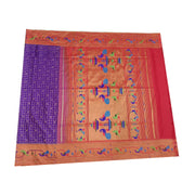 Paithani pure silk saree in purple with fine zari checks and floral motifs on the body.