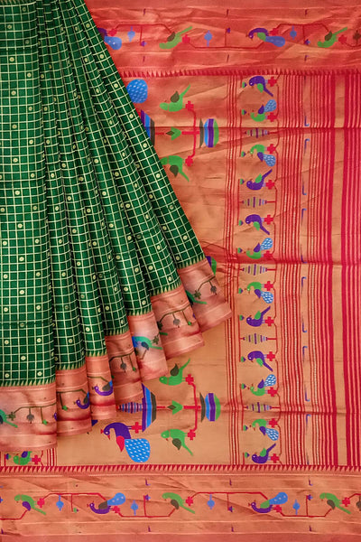 Paithani pure silk saree in bottle green with fine zari checks and floral motifs on the body.