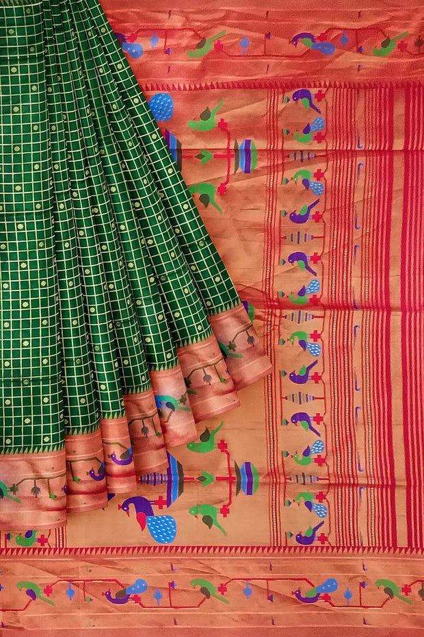 Paithani pure silk saree in bottle green with fine zari checks and floral motifs on the body.