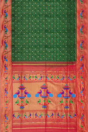 Paithani pure silk saree in bottle green with fine zari checks and floral motifs on the body.