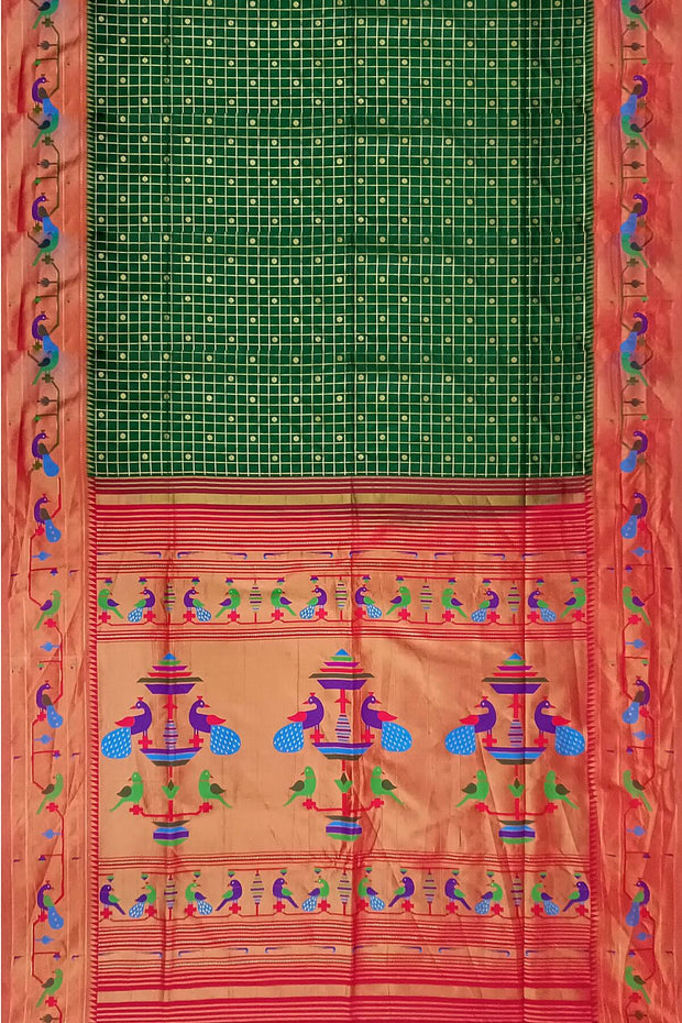 Paithani pure silk saree in bottle green with fine zari checks and floral motifs on the body.