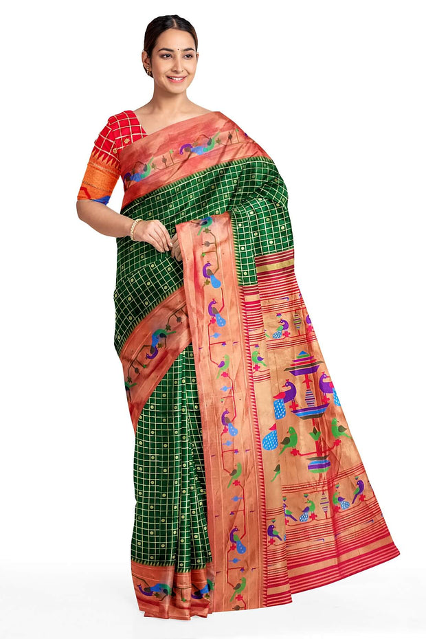 Paithani pure silk saree in bottle green with fine zari checks and floral motifs on the body.