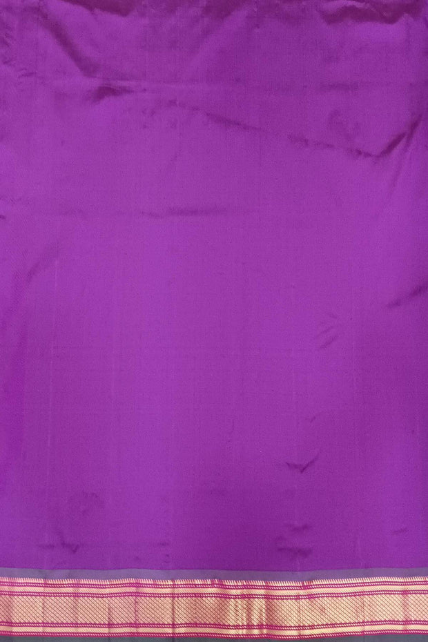 Handwoven Paithani pure silk saree in  purple with small mango motifs on the body