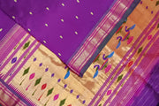Handwoven Paithani pure silk saree in  purple with small mango motifs on the body