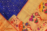 Paithani pure silk saree in violet with checks & buttis on the body .