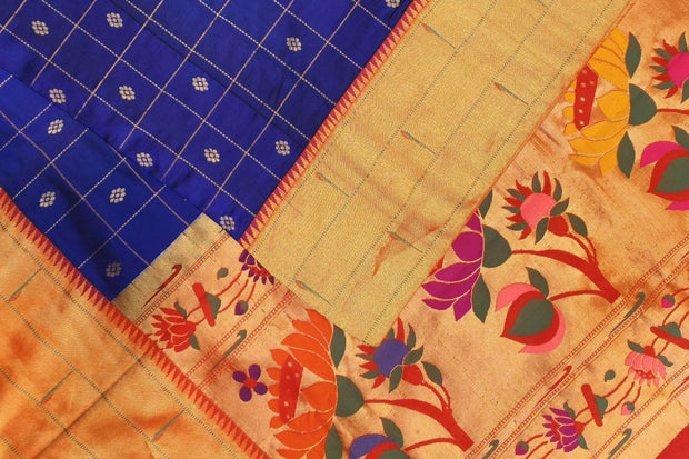 Paithani pure silk saree in violet with checks & buttis on the body .