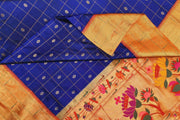 Paithani pure silk saree in violet with checks & buttis on the body .