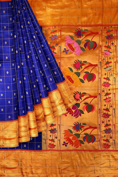 Paithani pure silk saree in violet with checks & buttis on the body .
