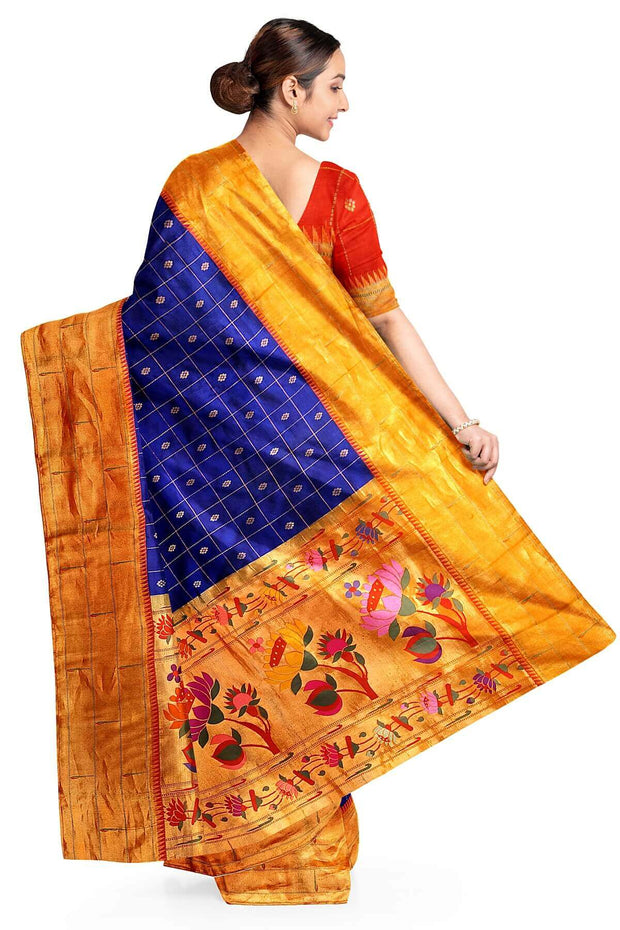 Paithani pure silk saree in violet with checks & buttis on the body .