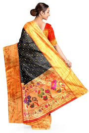 Paithani pure silk saree in black with checks & buttis on the body .