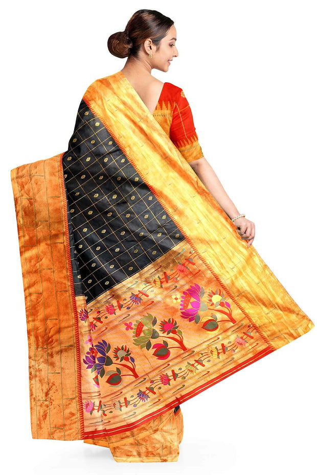 Paithani pure silk saree in black with checks & buttis on the body .