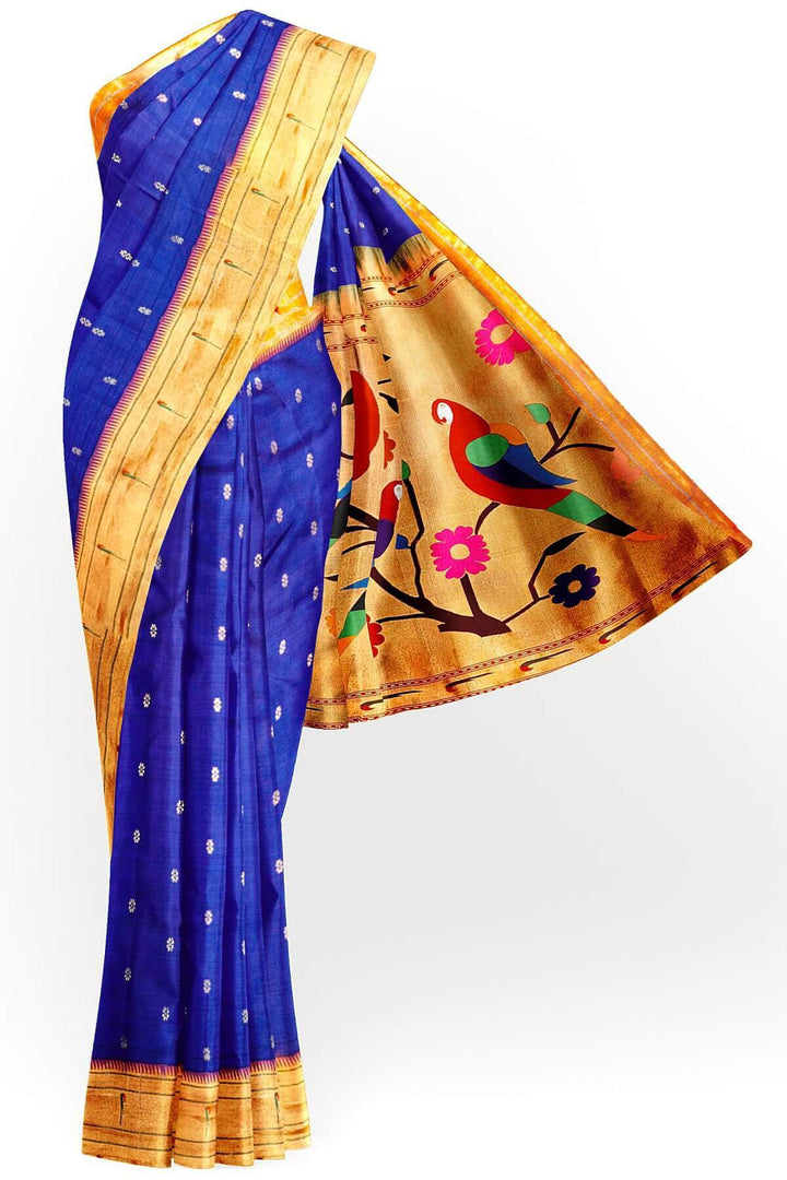 Paithani pure silk saree in royal blue with small floral motifs  on the body .