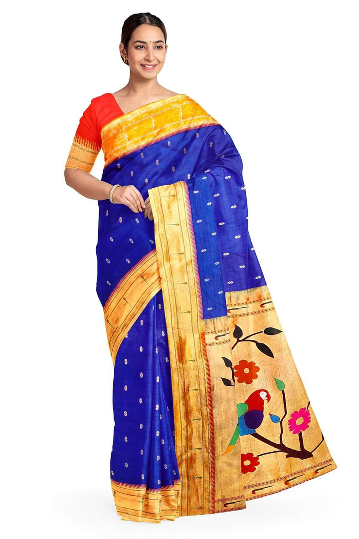 Paithani pure silk saree in royal blue with small floral motifs  on the body .