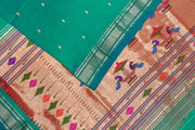 Handwoven Paithani pure silk saree in rama green with mango motifs