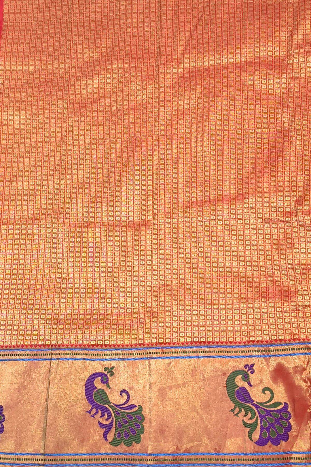 Paithani pure silk saree in wine with muniya motifs on the body.