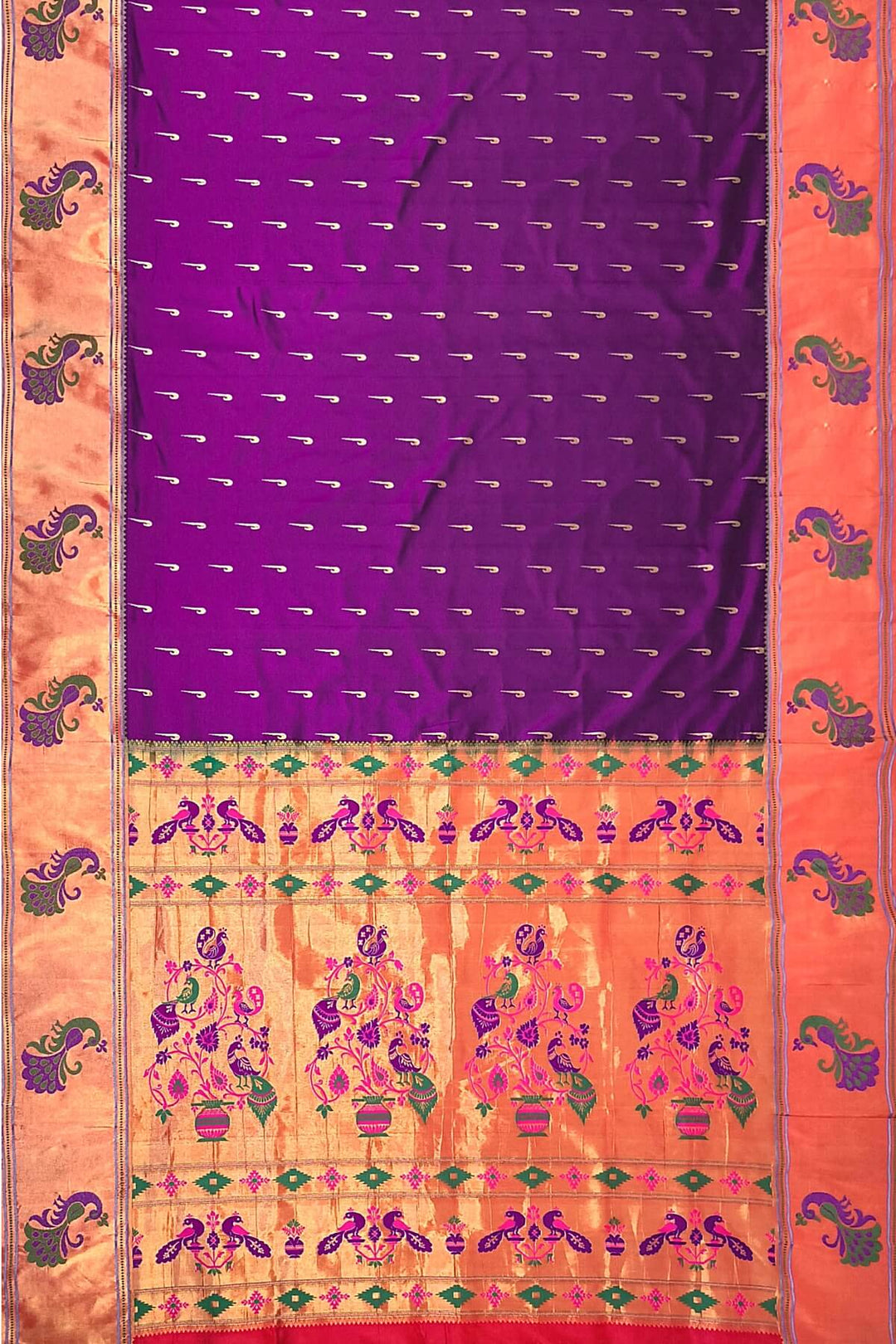 Paithani pure silk saree in wine with muniya motifs on the body.