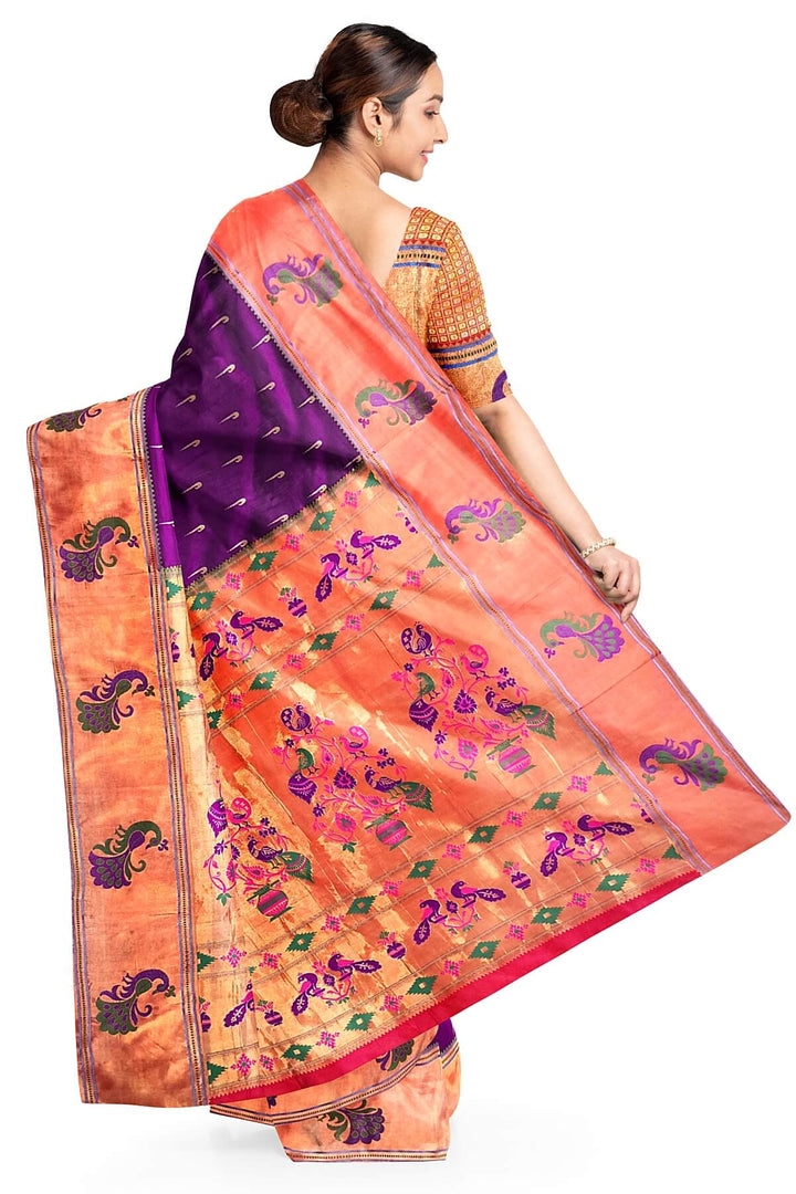 Paithani pure silk saree in wine with muniya motifs on the body.