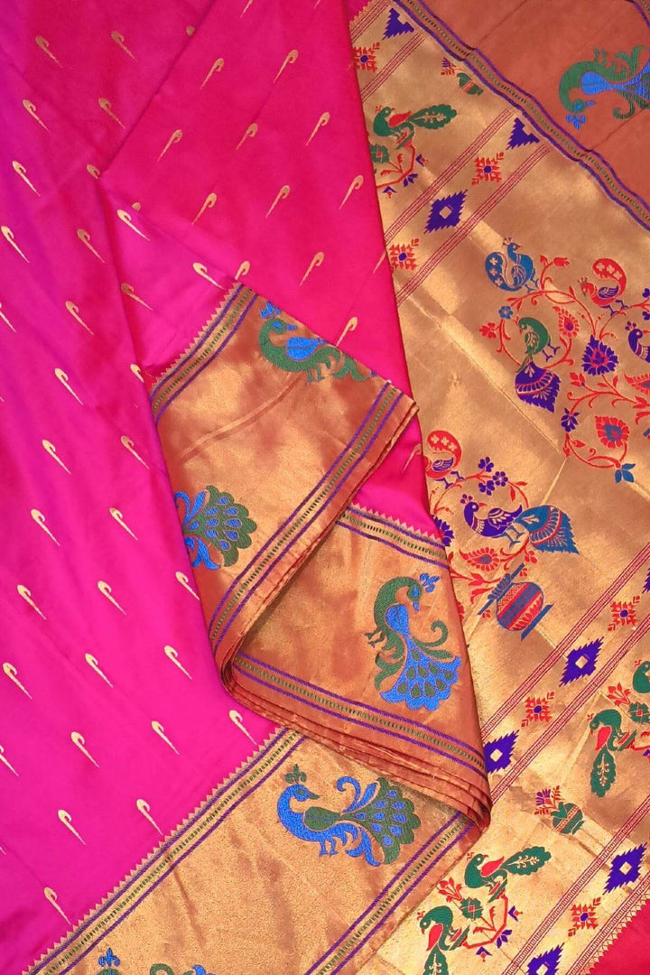 Paithani pure silk saree in pink with muniya motifs on the body.