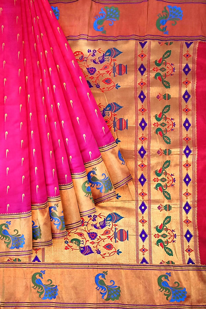 Paithani pure silk saree in pink with muniya motifs on the body.