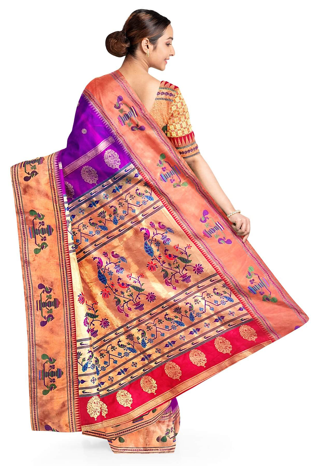 Paithani pure silk saree in purple with floral motifs on the body.