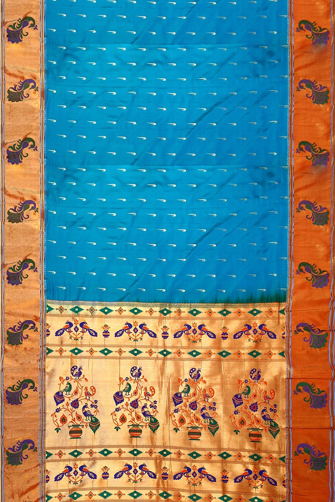 Paithani pure silk saree in blue with muniya motifs on the body.