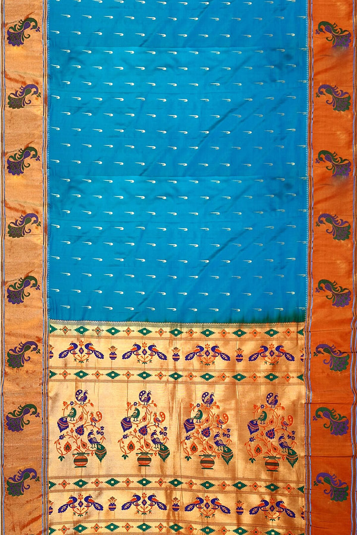 Paithani pure silk saree in blue with muniya motifs on the body.