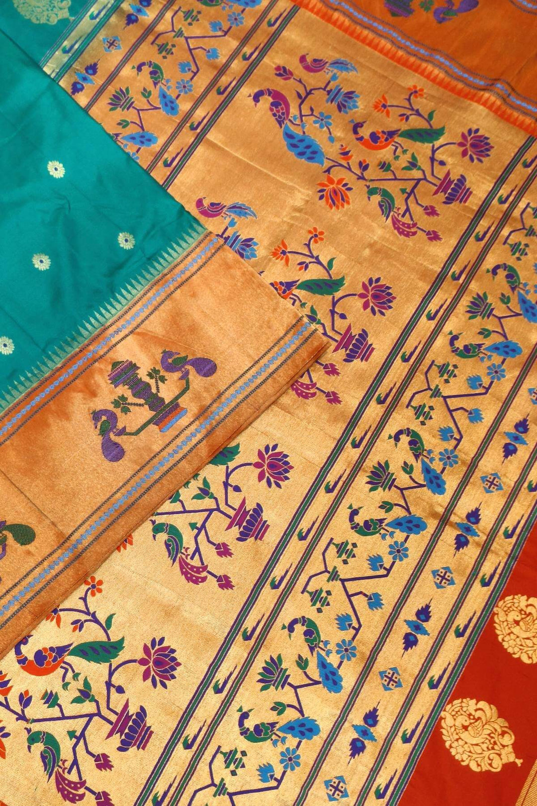 Paithani pure silk saree in green with with round buttis with meena work.