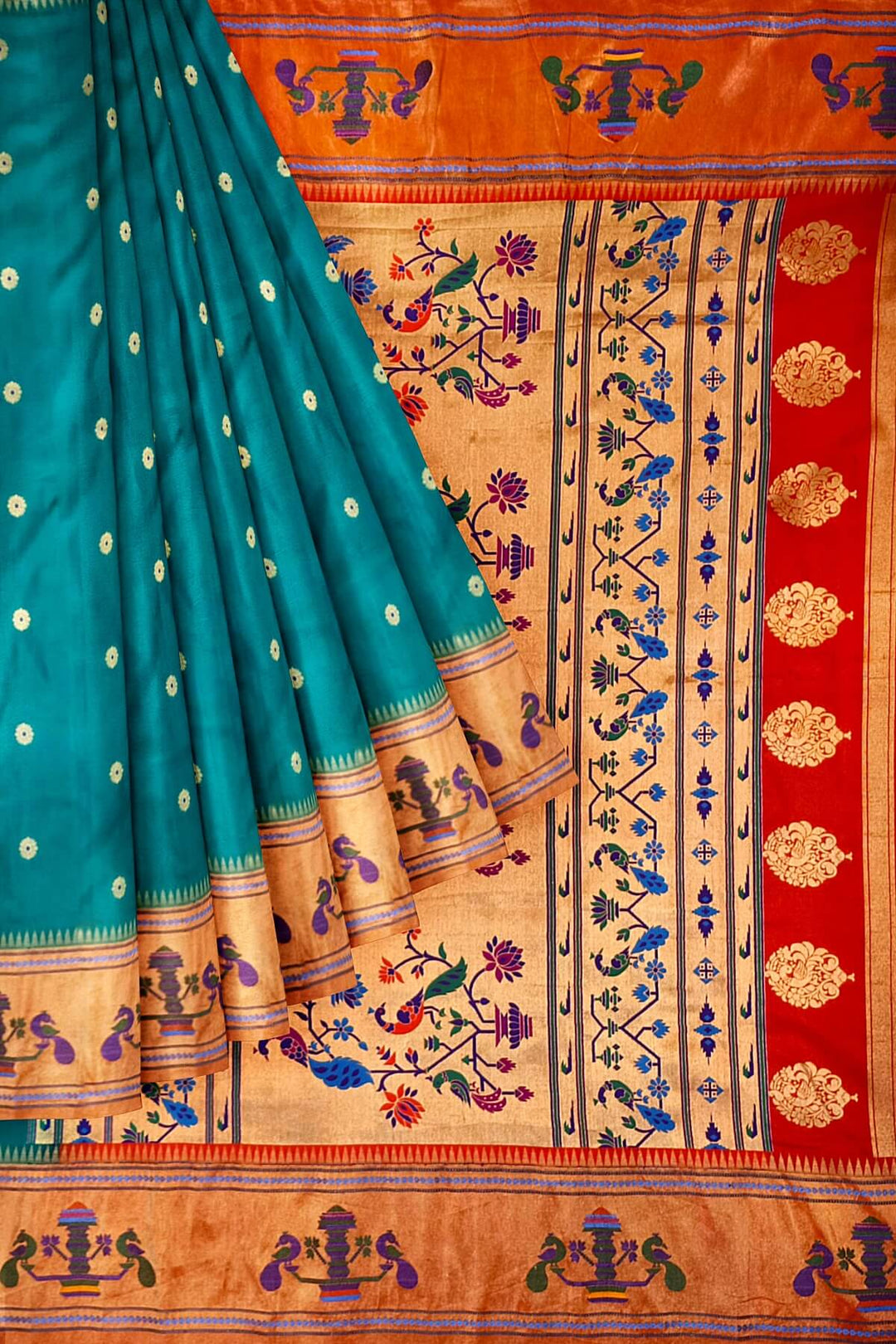 Paithani pure silk saree in green with with round buttis with meena work.